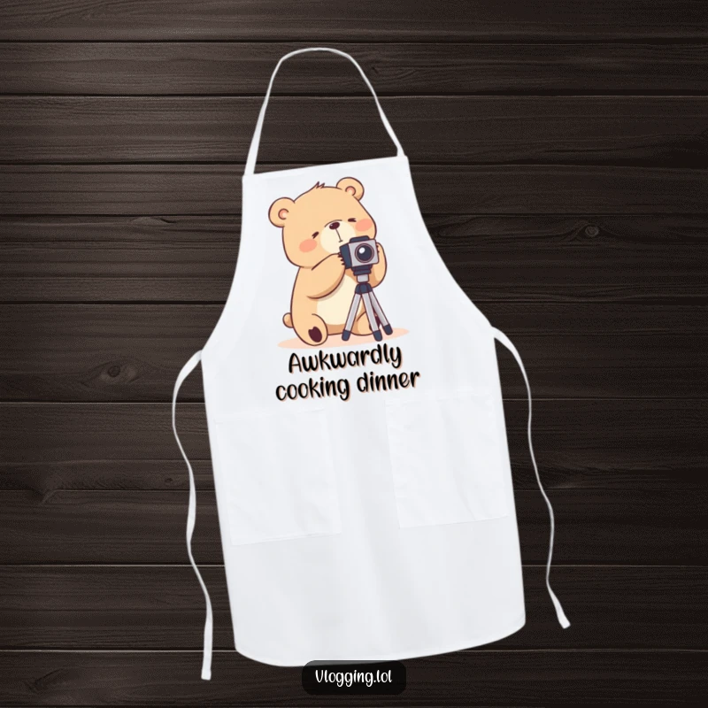 Funny apron featuring a silly bear awkwardly using a camera tripod, ideal for photography enthusiasts in the kitchen.