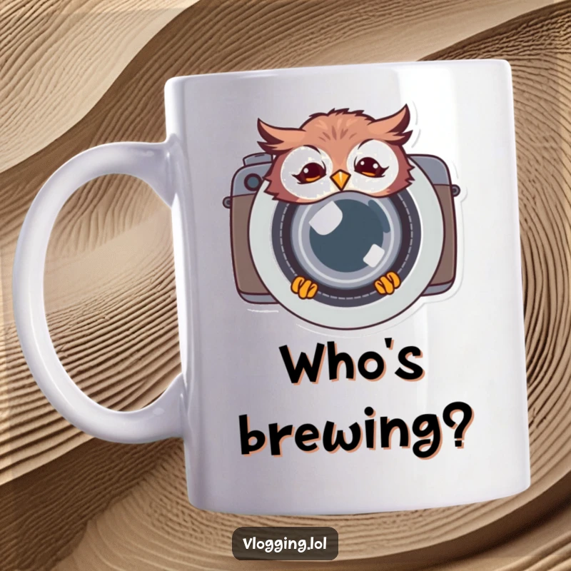 Funny giggling owl mug, peeking playfully from behind a large camera lens, conveying joy and a love for photography with a humorous touch.