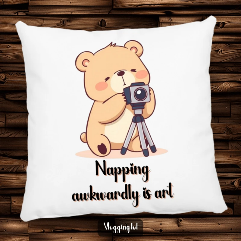 Funny pillow featuring a silly bear awkwardly handling a camera tripod, adding comfort and photography humor.