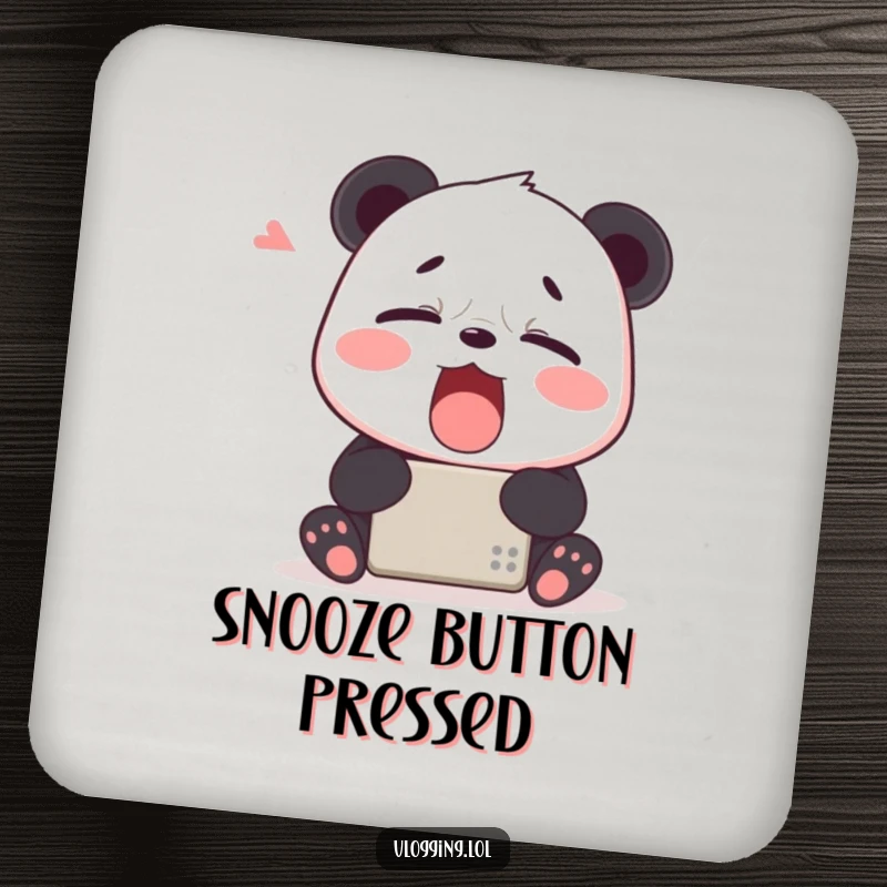 Funny drink coaster with a tired panda yawning widely in front of a digital device, adding a touch of humor and protection.