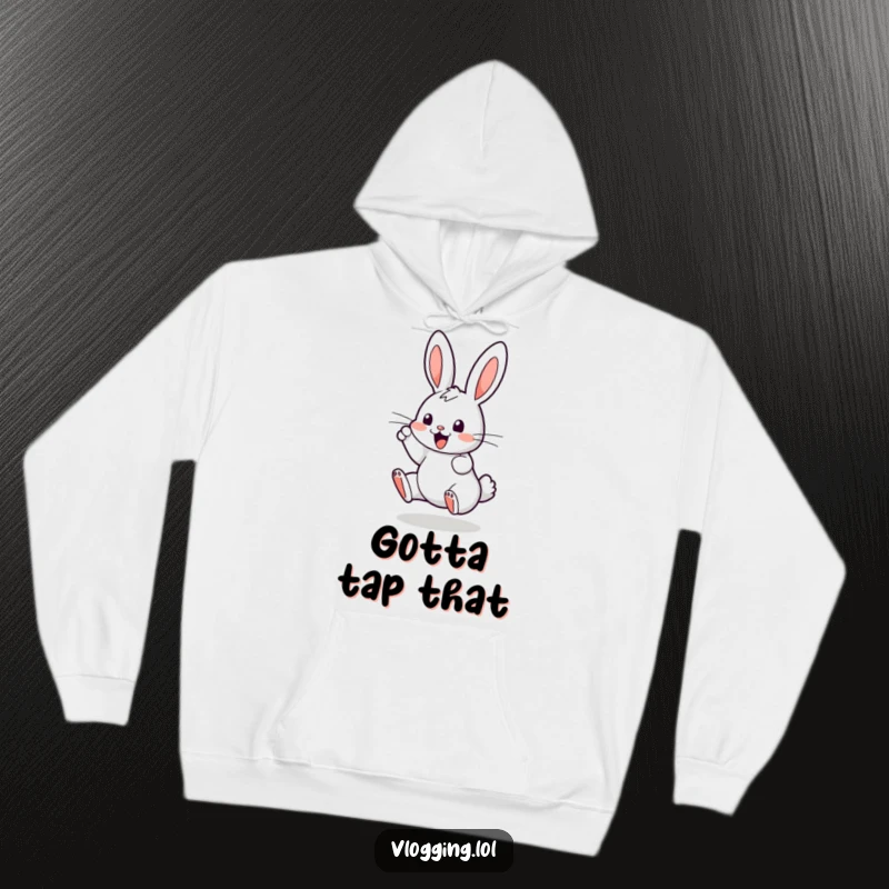 Funny hoodie featuring a bouncing bunny enthusiastically tapping on a digital screen, offering warmth and a humorous tech vibe.