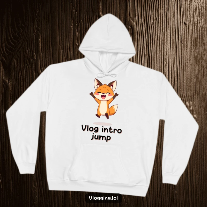Funny hoodie featuring an energetic fox jumping dramatically for an epic vlogging intro, comfortable creator apparel.