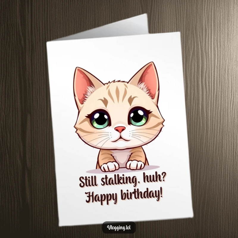 Funny Free Printable Birthday Card: Wide-eyed curious cat mesmerized by a glowing screen, perfect for a quirky greeting.