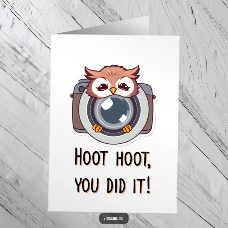 Funny free printable congratulations card with a giggling owl peeking from behind a camera lens, celebrating a great capture.