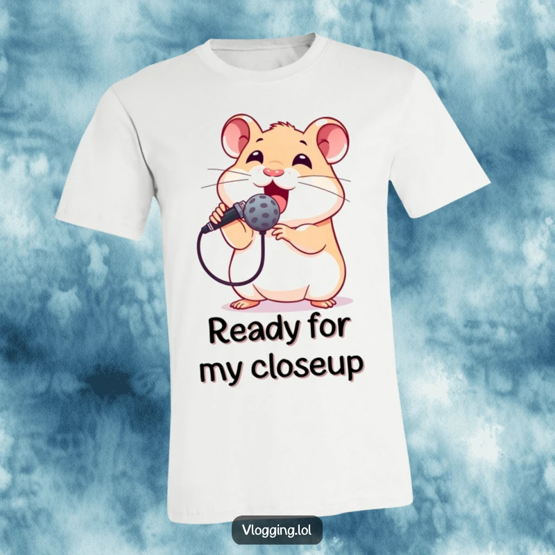 Funny t-shirt design of an excited hamster holding a microphone to its mouth, ready to perform with rockstar energy and great humor.