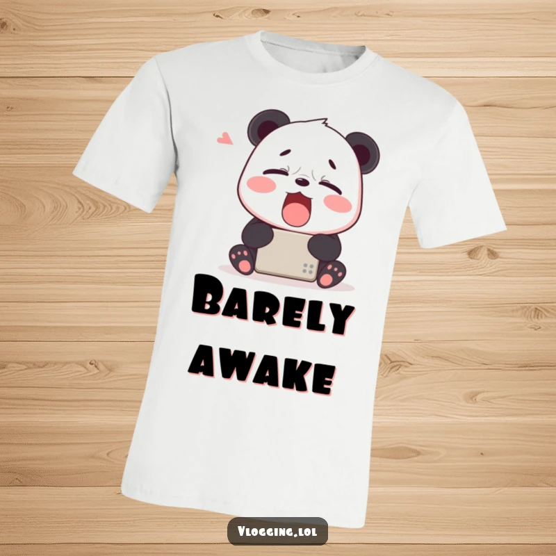Funny T-Shirt: A tired panda yawning widely in front of a digital device, humorously depicting screen fatigue.