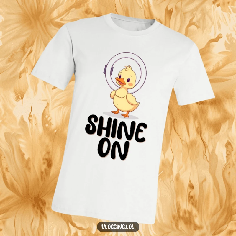 Funny wobbly duck t-shirt, hilariously balancing a ring light, perfect for creators who understand the quest for perfect lighting and a good laugh.
