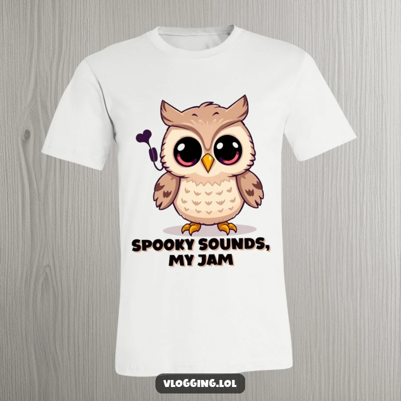Funny owl t-shirt of a joyful owl with wide eyes recording a spooky sound, perfect for Halloween enthusiasts.